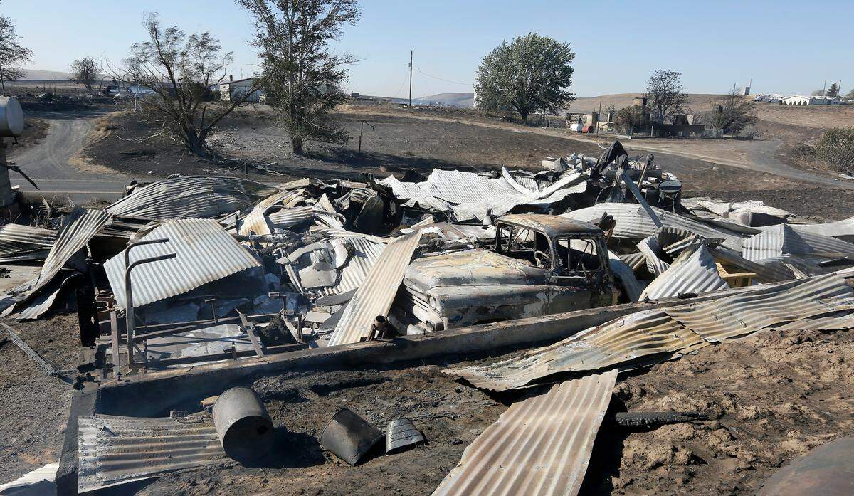 Two homestead farm houses and two shops burned Monday at the Peterson family farm on Burr Canyon Road off the Pasco-Kahlotus highway. The homes were vacant at the time.