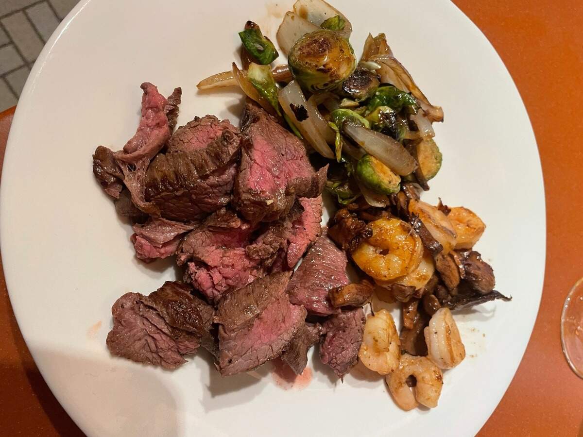 Add fresh harvested chanterelles and pigs ears to a meal of flank steak, shrimp, roasted brussels sprouts and sweet onion for a gourmet treat.