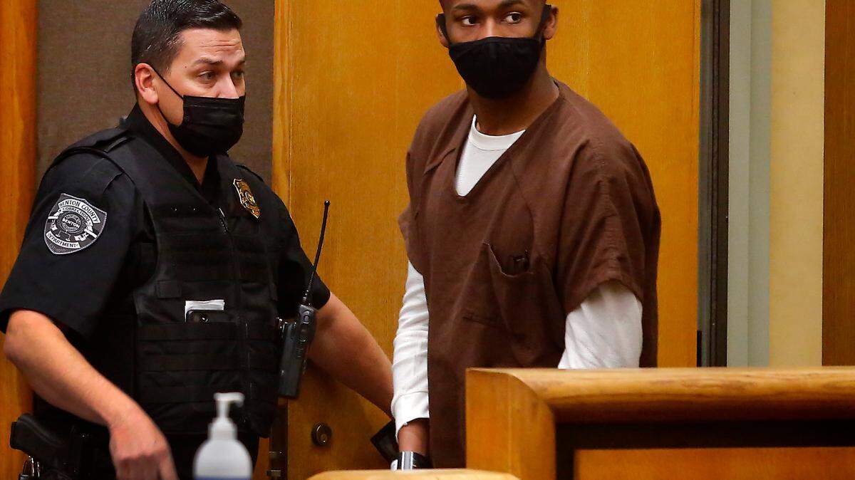 Tyshawn Brooks enters a Benton County Superior Courtroom on June 15 for a change of plea hearing in connection with a January 2021 shooting of a former classmate while robbing him during a deal for e-cigarettes.