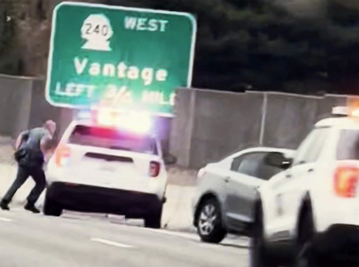 Washington State Patrol troopers chase a suspect trying to flee along the Highway 240 bypass in Richland.