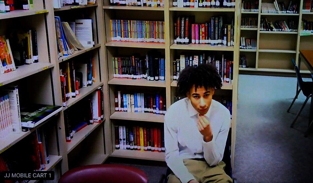 Jacquez Young, a now 16-year-old murder suspect, appears Wednesday morning in Benton County Superior via video link from the Benton Franklin Juvenile Justice Center in Kennewick. Superior Court Judge Diana Ruff recently ruled that it would be in the best interest of the public to try Jacquez Young in adult court in a written decision. Prosecutors have not officially charged Young in adult court yet. He has been facing one court of first-degree murder in Benton-Franklin Juvenile Court for the April death of 17-year-old Ricardo Rivera.
