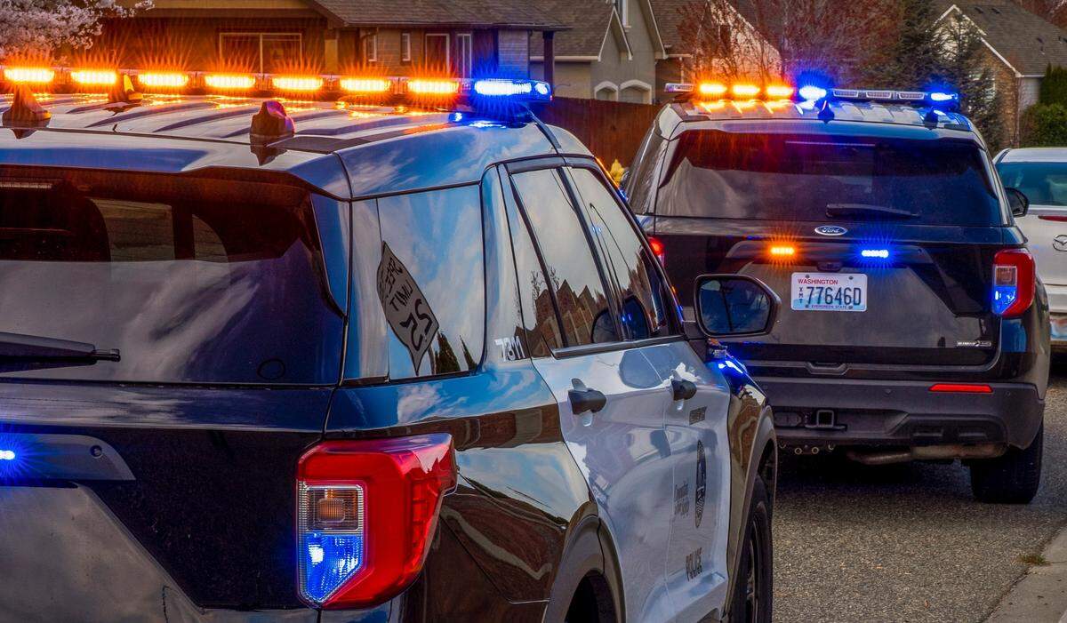 Kennewick police investigate a deadly shooting at the Crown Village apartments in July 2024.