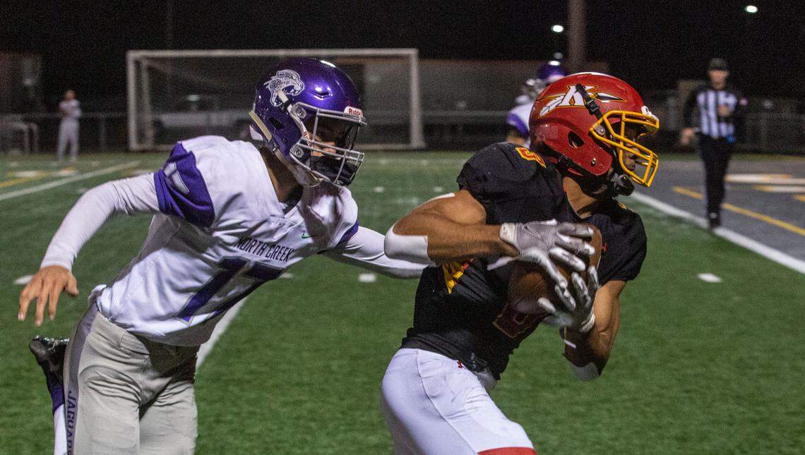 Kamiakin senior EJ Hawkins runs for a touchdown during the first quarter of the playoffs game against North Creek at Lampson Stadium in Kennewick.
