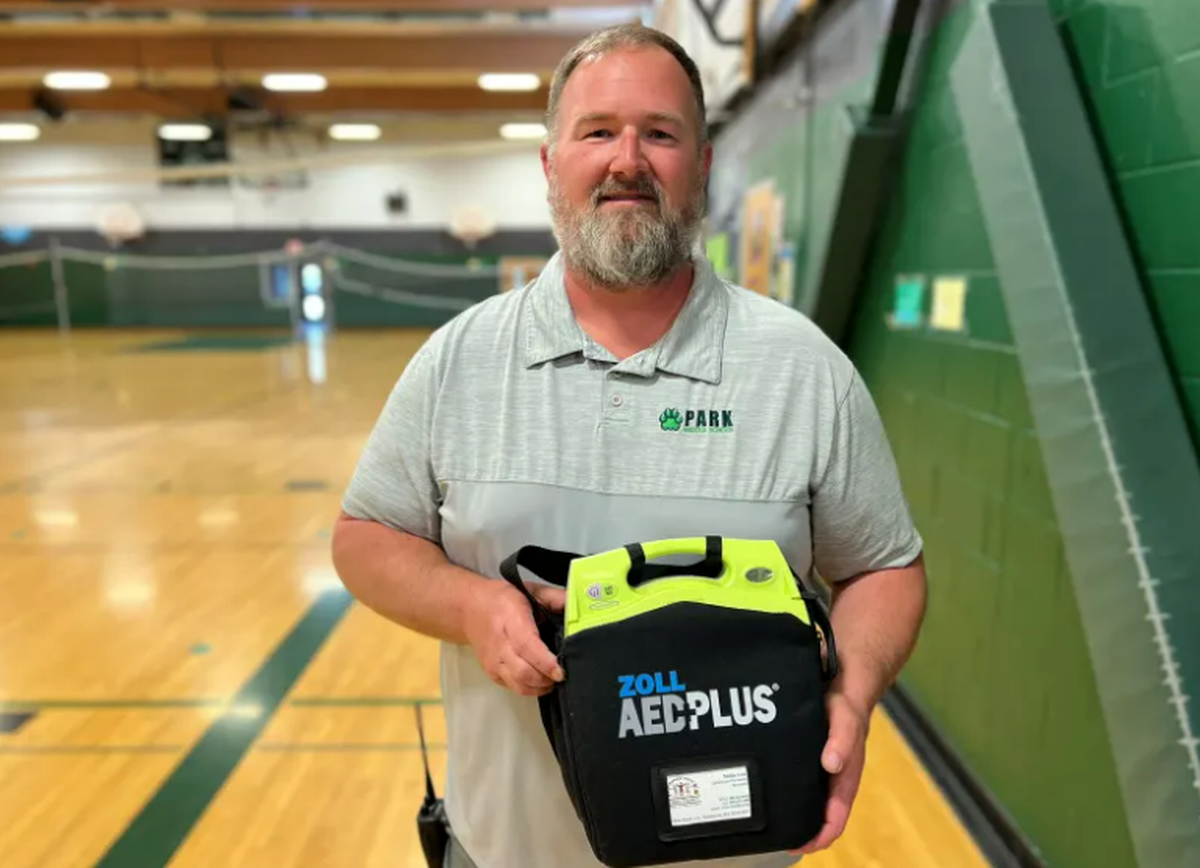 Dwane Sitler, a Park Middle School teacher in Kennewick, saved a student’s life by quickly using an AED after the student became uncscious after running a mile during a PE class.