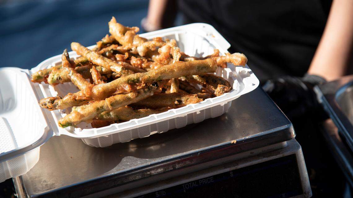 Drive-up asparagus is back. And there’s purple asparagus for a cause