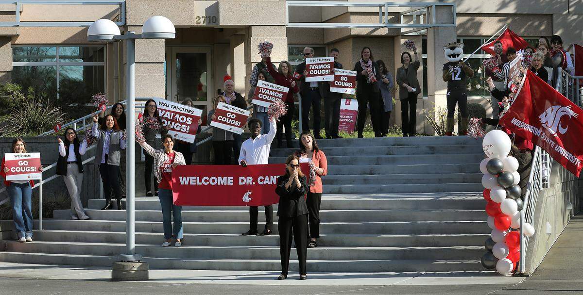 WSU Tri-Cities Chancellor Sandra Haynes, front, leads a welcoming party for new WSU President Elizabeth Cantwell on Wednesday at the branch campus in Richland.