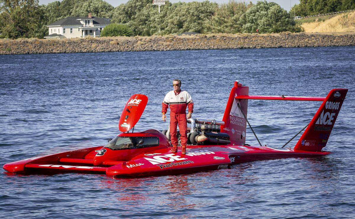 U-3 Go3 Racing’s driver Jimmy King stands on his hydro after finishing a heat during Water Follies at Columbia Park in Kennewick.