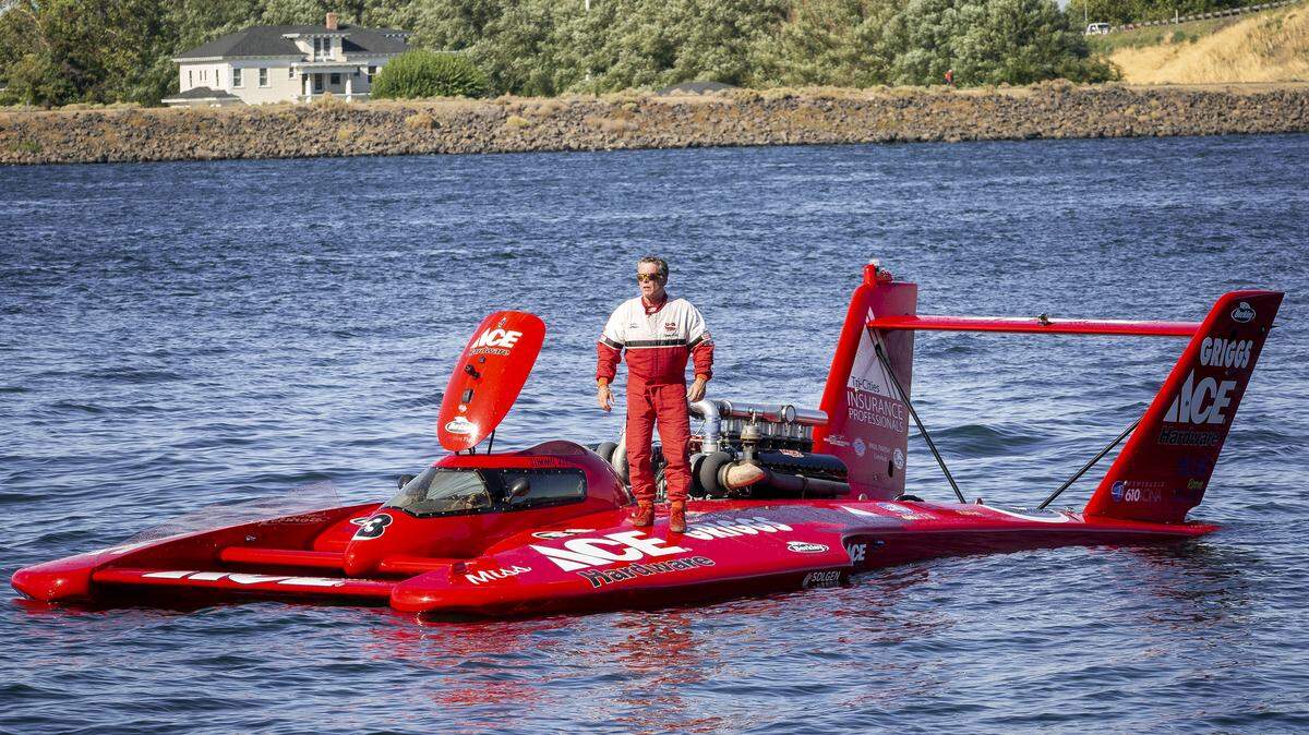 U-3 Go3 Racing’s driver Jimmy King stands on his hydro after finishing a heat during Water Follies at Columbia Park in Kennewick.