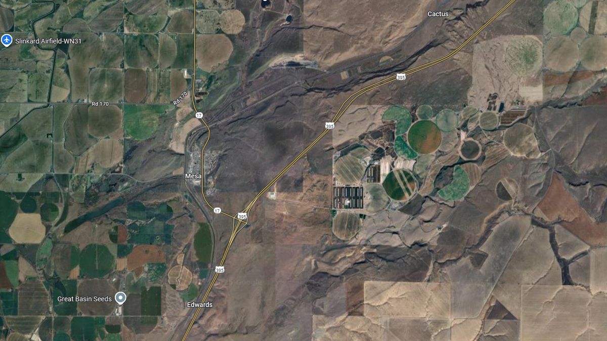 A 75-year-old woman was hurt when her car flipped on Highway 395 Monday afternoon.