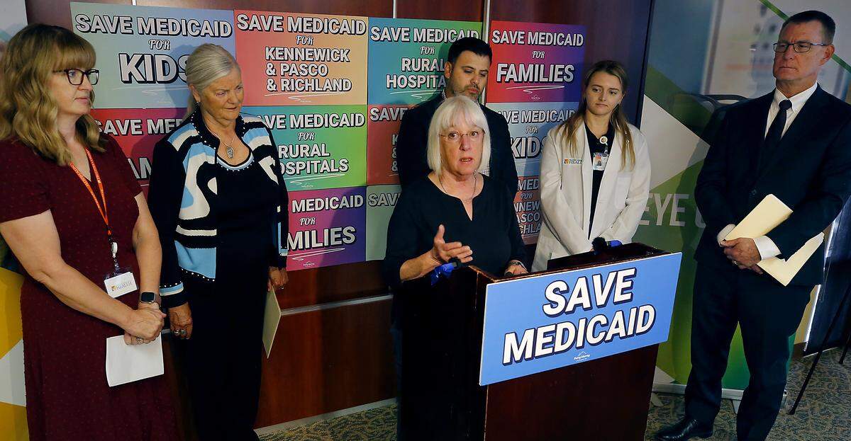 Sen. Patty Murray, D-Wash, holds a news conference Wednesday in Pasco with local hospital and community health leaders to call attention to how cuts to Medicaid will impact health care.  From left behind her, are: Kristy Needham, CEO Tri-Cities Community Health, Cynthia Flynn, Founder and CEO of Columbia Birth Center, Nieves Gomez, CEO Columbia Basin Health Association, Dr. Georgia Schafer, Tri-Cities Community Health and Brian Gibbons, President and CEO of Astria Health.