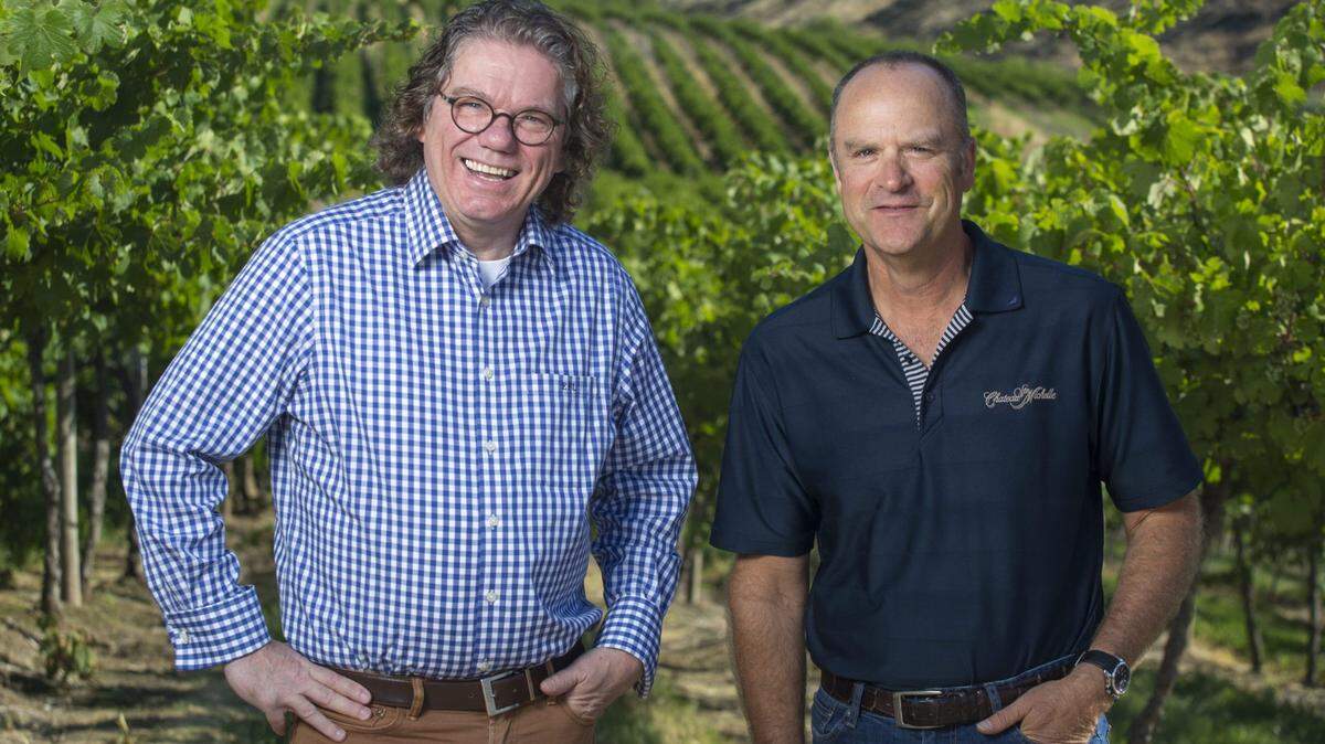 Ernesti Loosen, left, and Bob Bertheau work with vines in Washington’s Columbia Valley to produce Eroica Riesling for the partnership that is Dr. Loosen in Germany and Chateau Ste. MIchelle in Washington state.