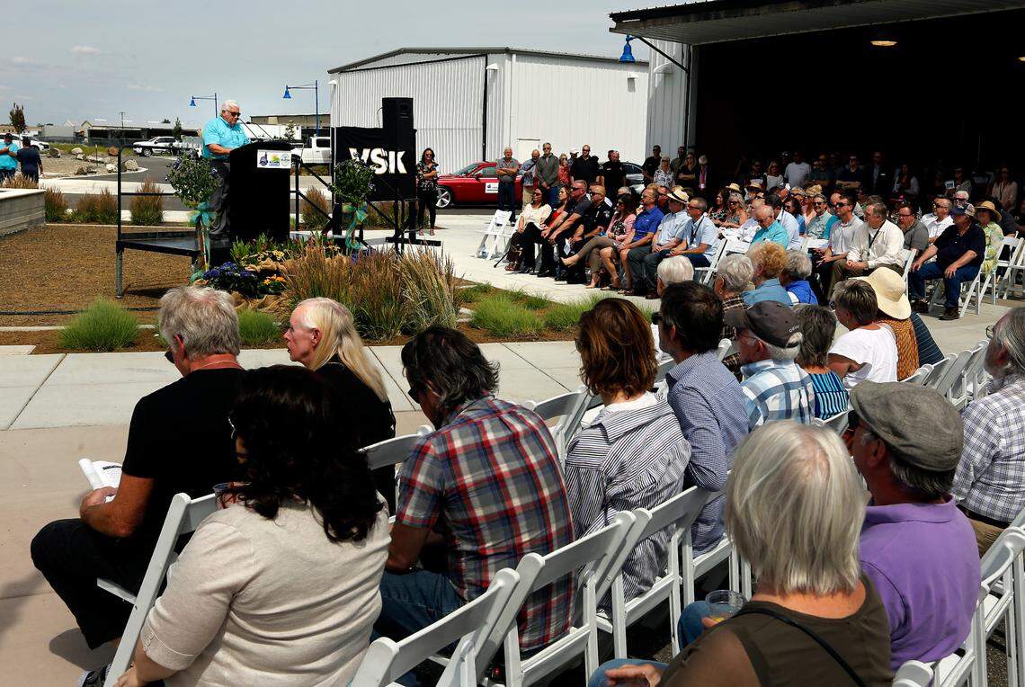 Skip Novakovich, Port of Kennewick Commission president, recognizes local officials and leads the Pledge of Allegiance during grand opening event for the Vista Field phase one site improvements. More than 500 people were expected at the event.