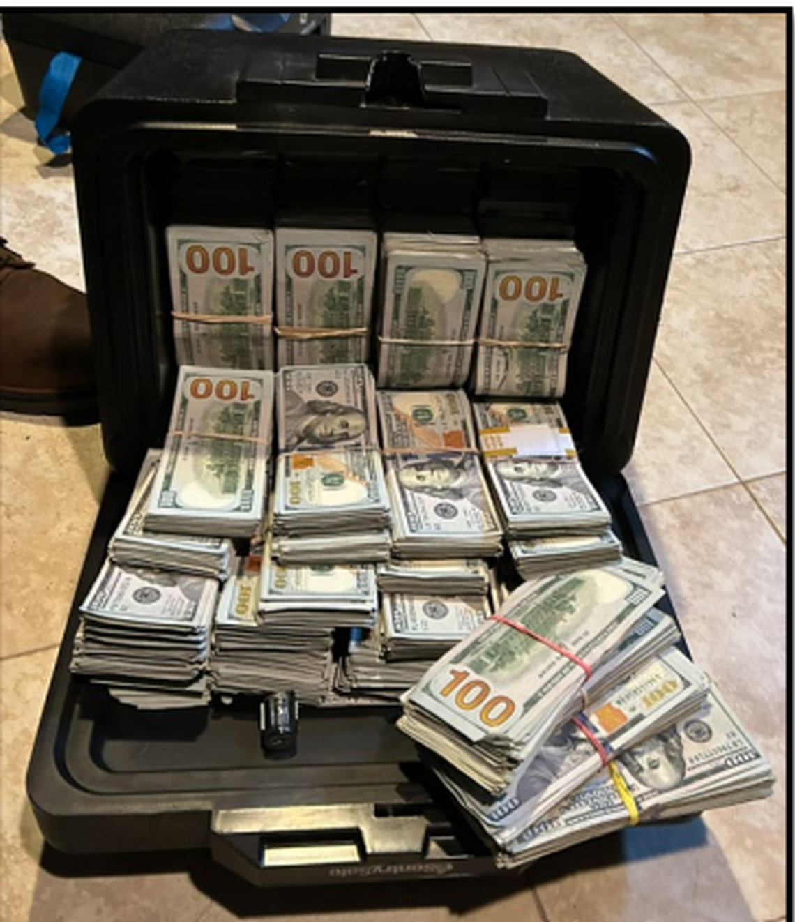 Drug Enforcement Administration search warrants served March 3, 2026, at multiple Tri-Cities residences in an illicit drug investigation led to the seizure of $2 million. Some of that money is shown.
