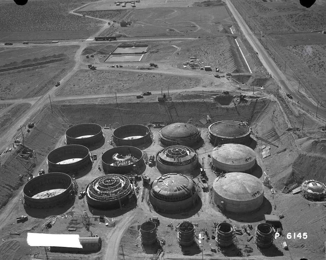 Hanford underground waste Tank B-109 is among 16 shown under construction in the B Tank Farm in the center of the nuclear reservation during World War II.