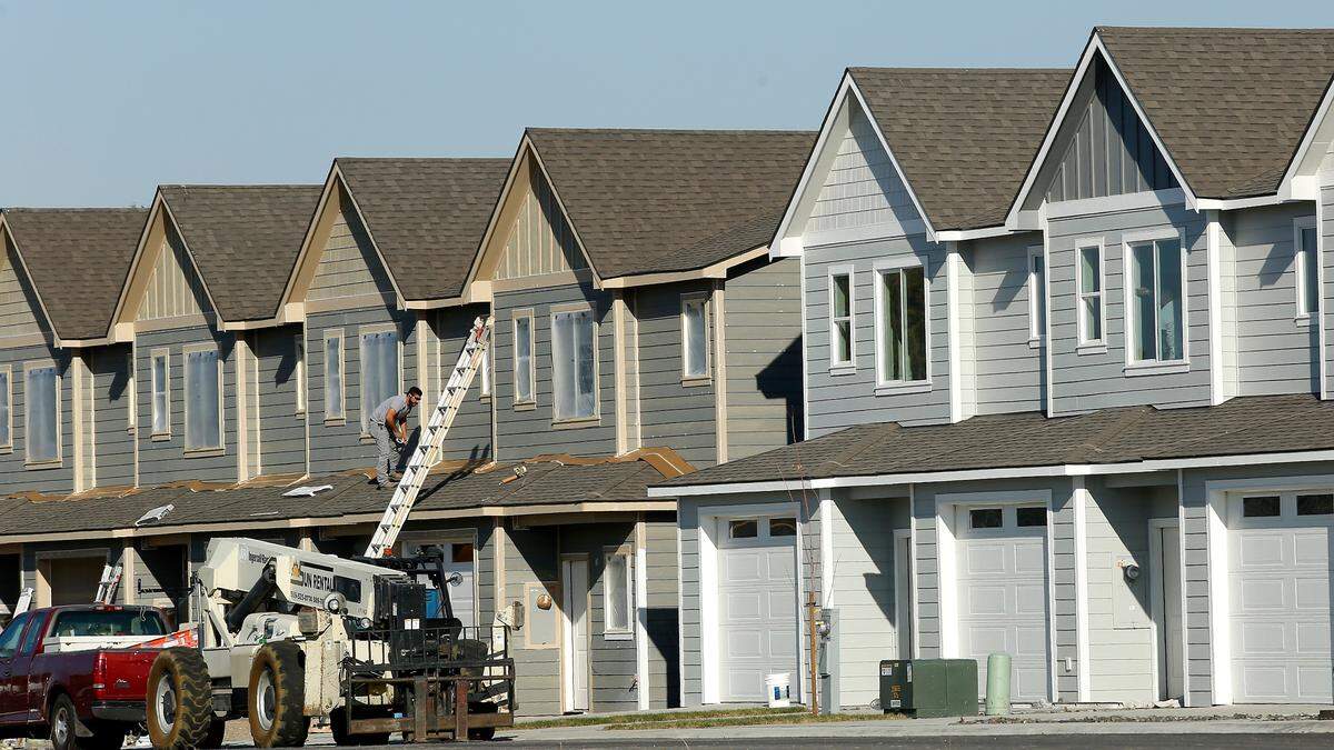 Developer Stan Nuxall built Midtown Village off West Seventh Avenue adjacent to Highlands Middle School in Kennewick. The project featured attached townhomes or what is called a zero lot line in the construction industry.