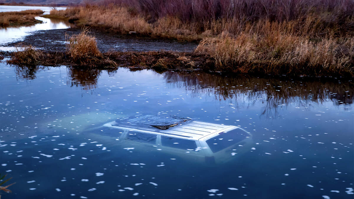 A fully submerged Jeep Cherokee sits beneath the surface of the Columbia River near the Ringold Boat Launch after entering the water late Friday night, Dec. 26. Franklin County Sheriff’s Office deputies and medical crews responded and assisted two occupants, who escaped the vehicle before it sank and were treated for hypothermia. No injuries were reported, and the cause of the crash has not been released. 