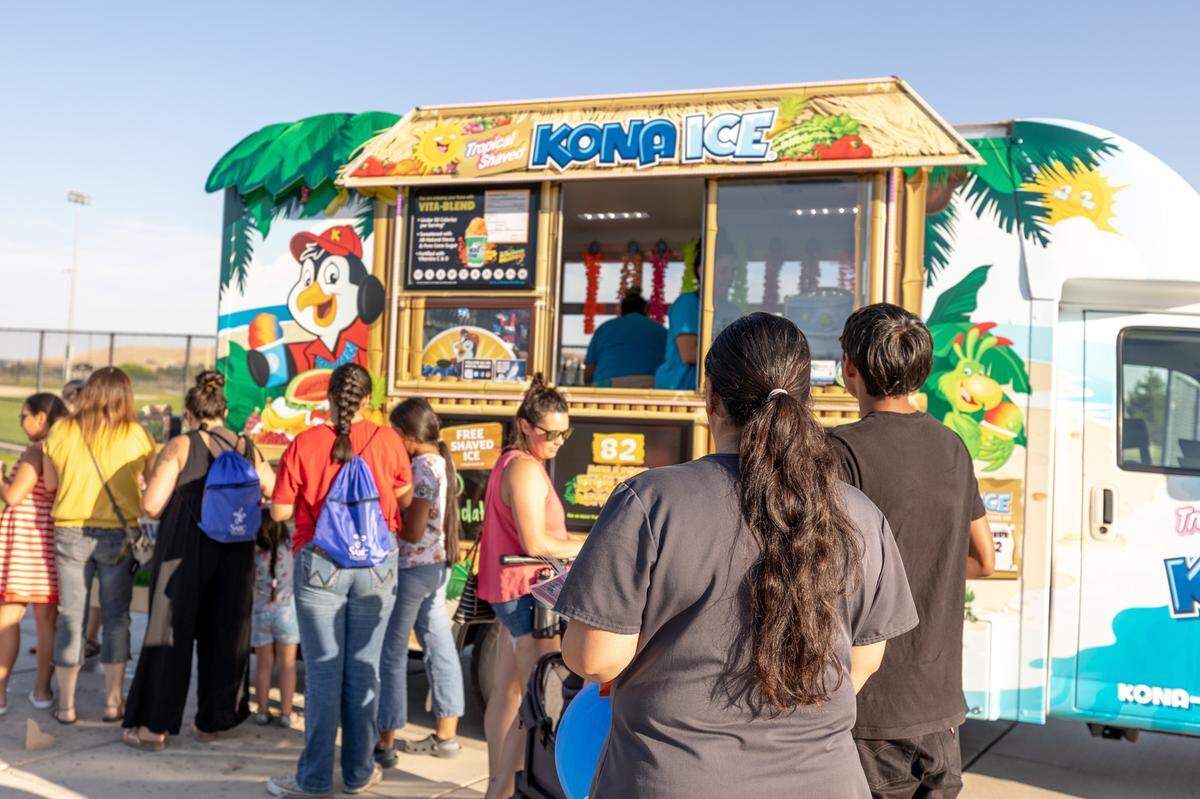 The police department sponsor Kona Ice to serve free Ice Cones to the community during National Night Out in Kennewick