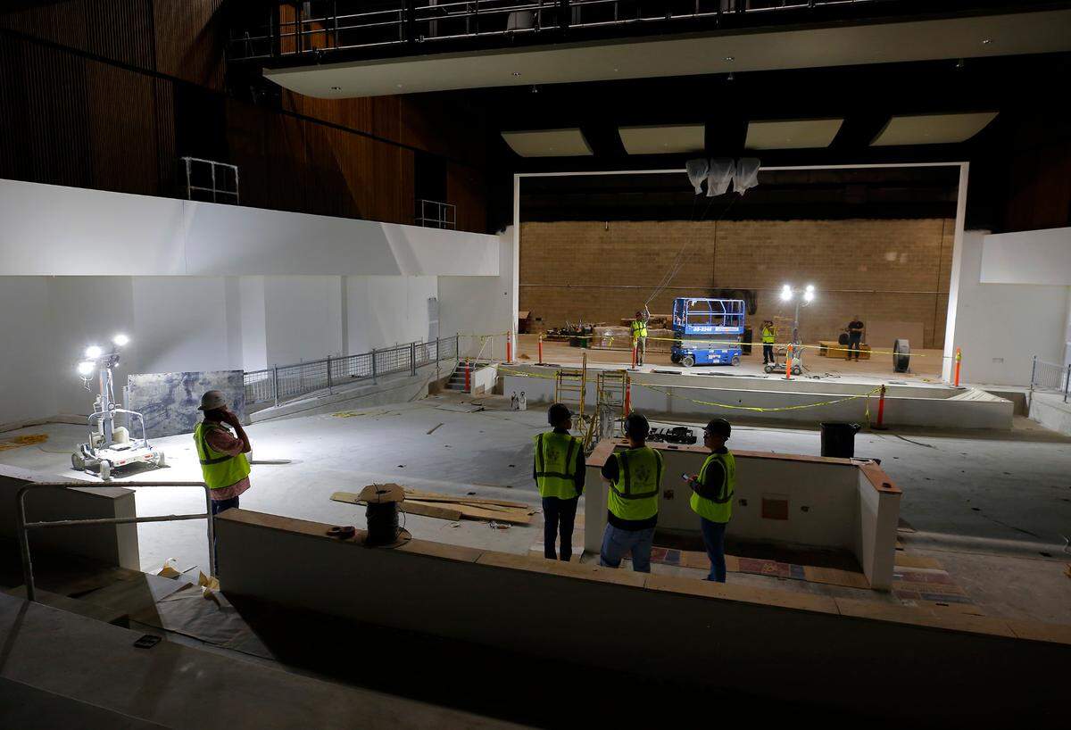 A tour group looks at the partially completed auditorium at Sageview High School in Pasco.