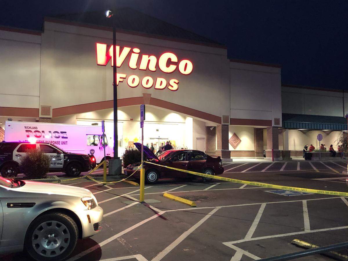 A woman was shot Monday when a man opened fire inside the Richland Winco grocery store.