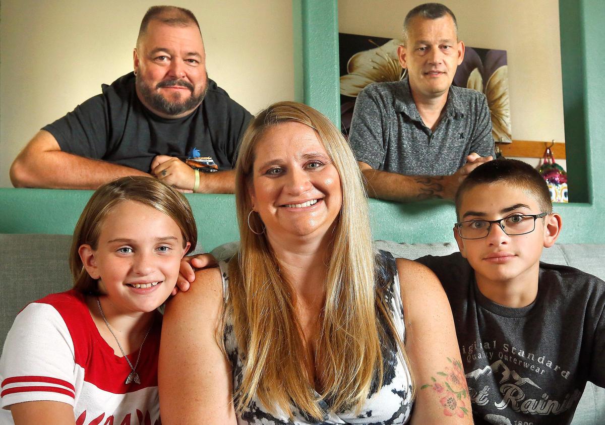 Amanda Brown will join more than 1,000 other Washington residents Sept. 7 at T-Mobile Park in Seattle to take part in the Western Governor University’s largest commencement in its 22-year history. Brown, a dual language teacher at Fuerza Elementary in Kennewick, is celebrating receiving her master’s degree. She is surrounded in her Pasco home, clockwise from left, by her daughter, Aurelia, 9, husband Ray Dolin, family friend Keith Posey, and son, Clifton, 12. Watch a video at: tricityherald.com/video