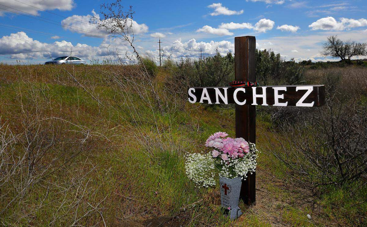 A roadside memorial was placed by family and community members off Highway 240 near the site where Jhoser Vega Sanchez was hit and killed on March 1 while riding his motorcycle.