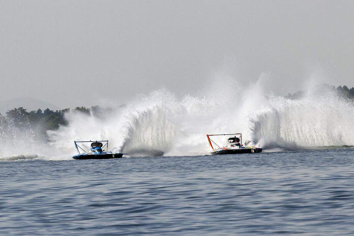 Jimmy Shane in the U-1 Homestreet Bank unlimited hydroplane flies to victory in heat 2B Saturday in front of Andrew Tate in the U-9 Les Schwab tire unlimited hydroplane Saturday afternoon in the Columbia River.