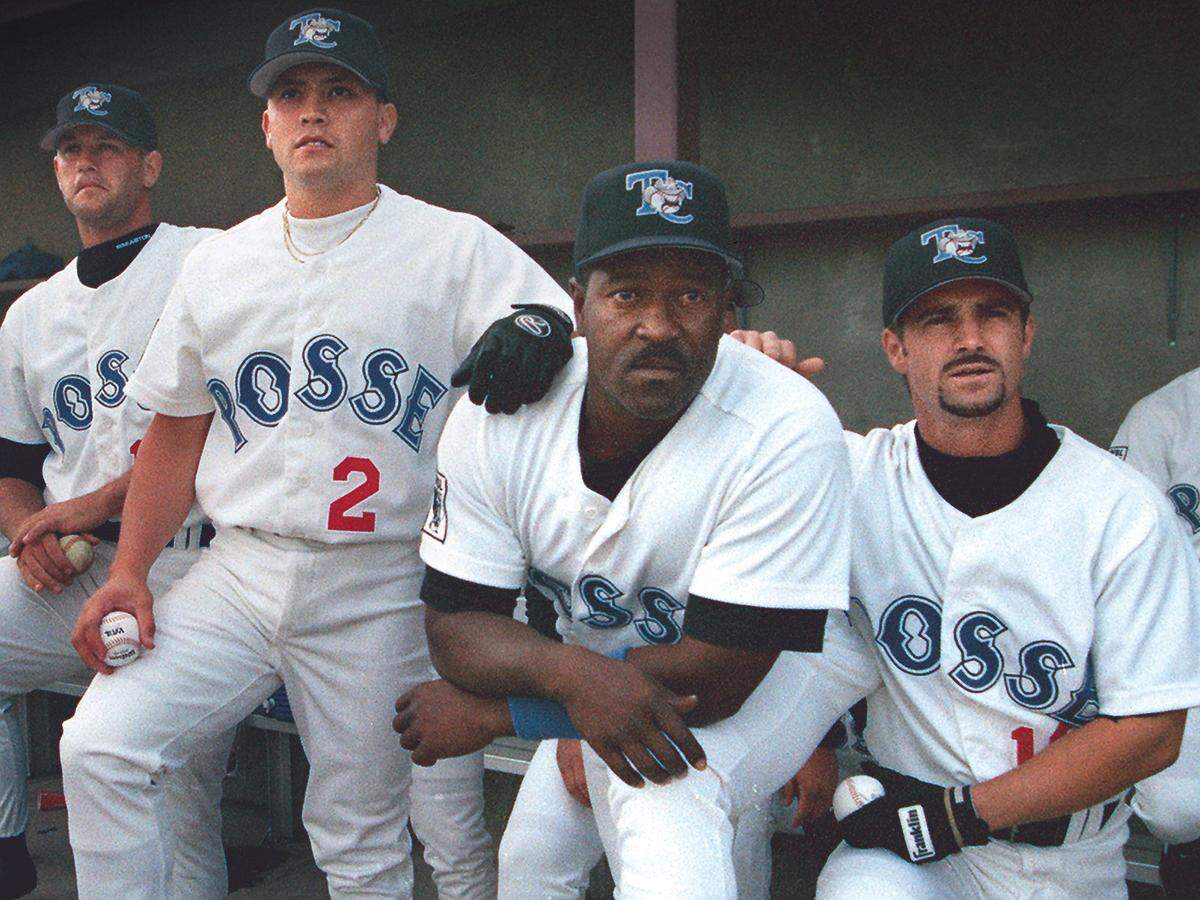From left, Tom Engle, Ryan Rutz, Tim Wallace and R.J. Palma watch as the Long Beach Riptide players are announced before the first 1996 Posse home game.
