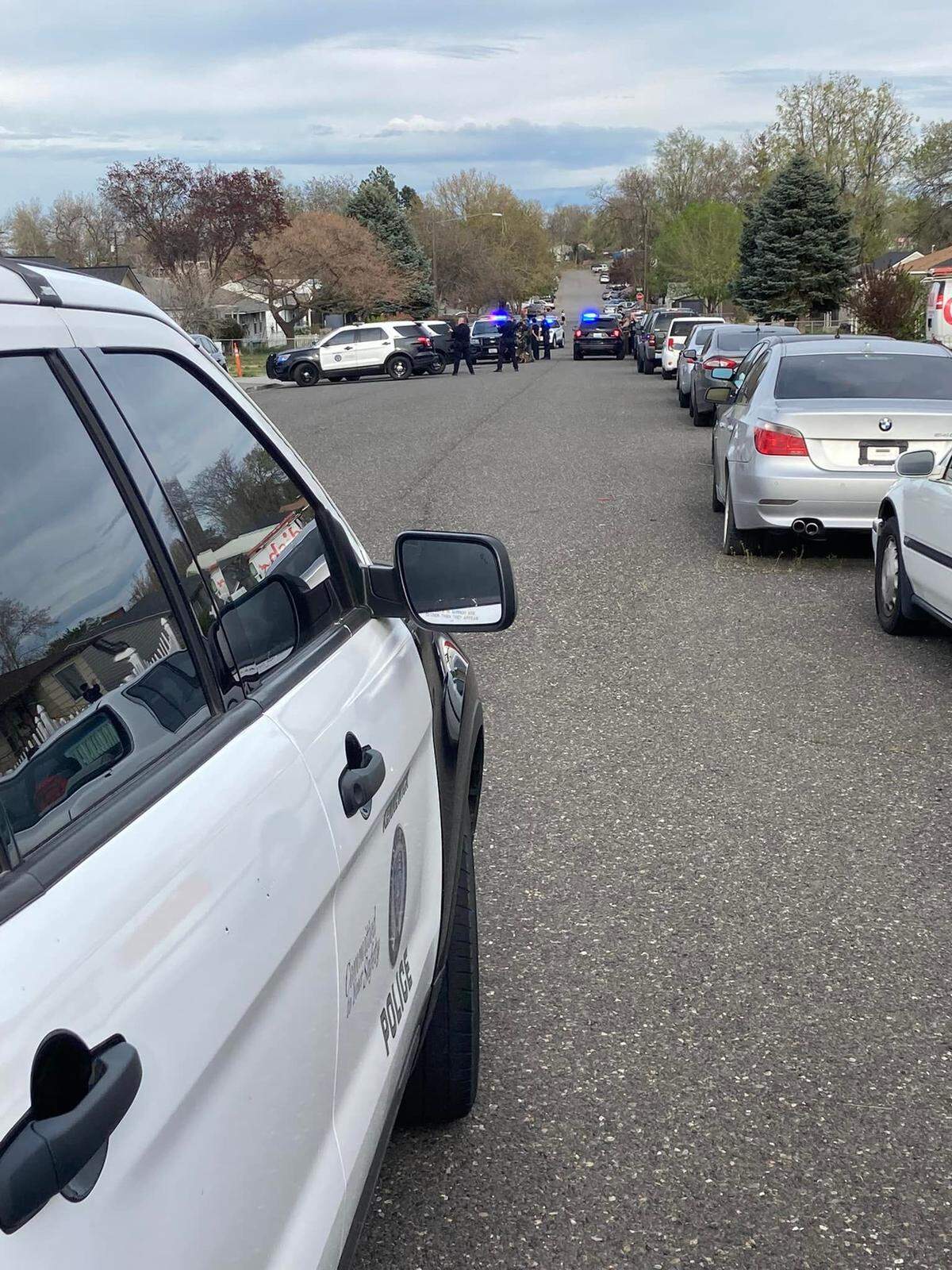 Kennewick police have surrounded a home near the intersection of West Fifth Avenue and South Washington Street. Police are investigating it in connection with Wednesday’s shooting.