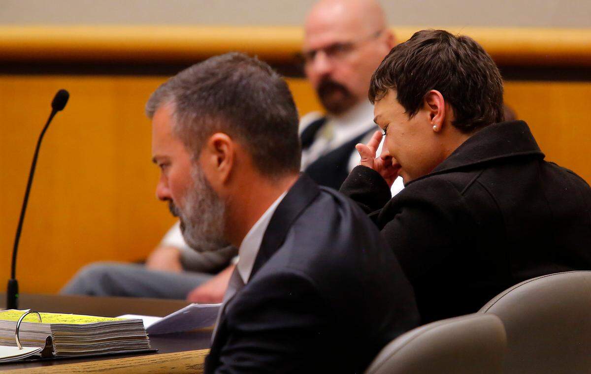 Katie Summers wipes away tears as her sister speaks on her behalf during Thursday sentencing hearing in hit and run vehicular homicide of moped rider Leo Birrueta in August, 2018. She is seated next to her defense attorney Brian Roach in Benton County Superior Court.