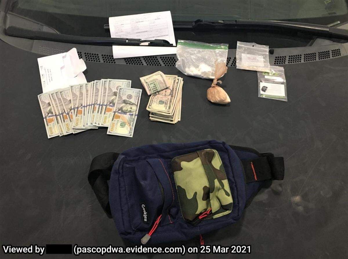 Pasco police arrested a 16-year-old with a stolen handgun, cash and cocaine.