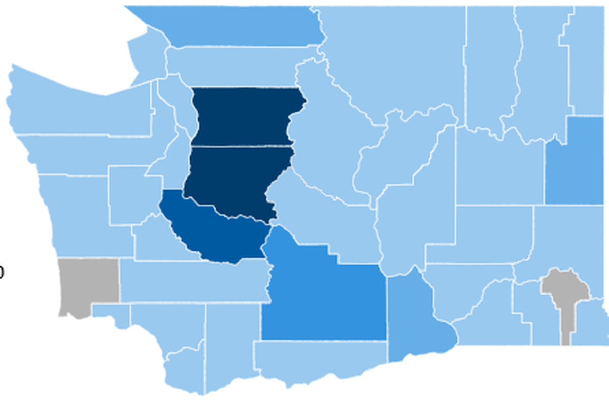 A map of Washington shows confirmed COVID-19 case levels by county, with the darker the color, the more cases, as of the start of the week. Pacific and Garfield counties had no cases.