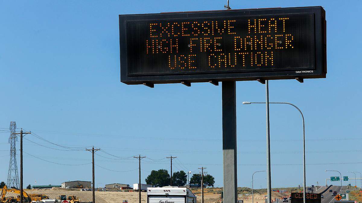 An electronic highway message board in the southbound lanes of Highway 395 in Kennewick.