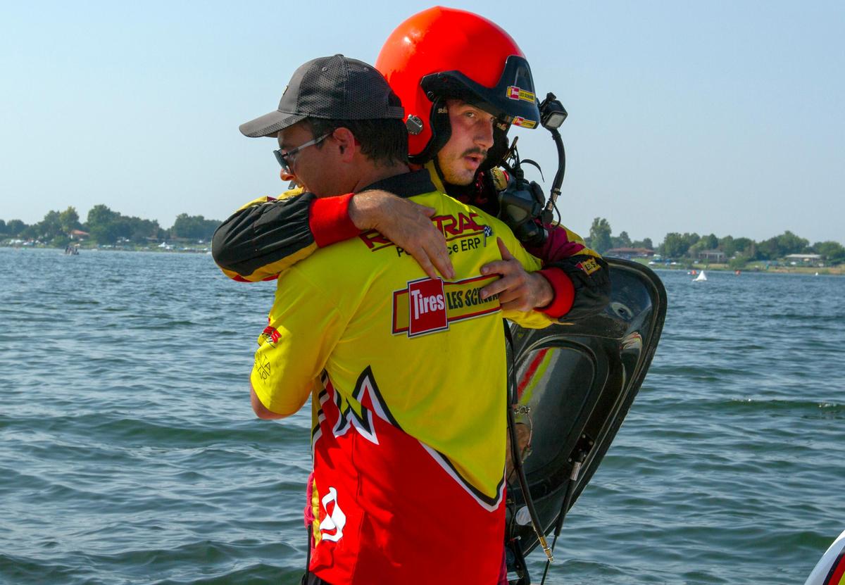 Andrew Tate in the U-9 unlimited hydroplanes hugs one of his crew member after winning the HAPO Columbia Cup on Sunday at Columbia Park in Kennewick.