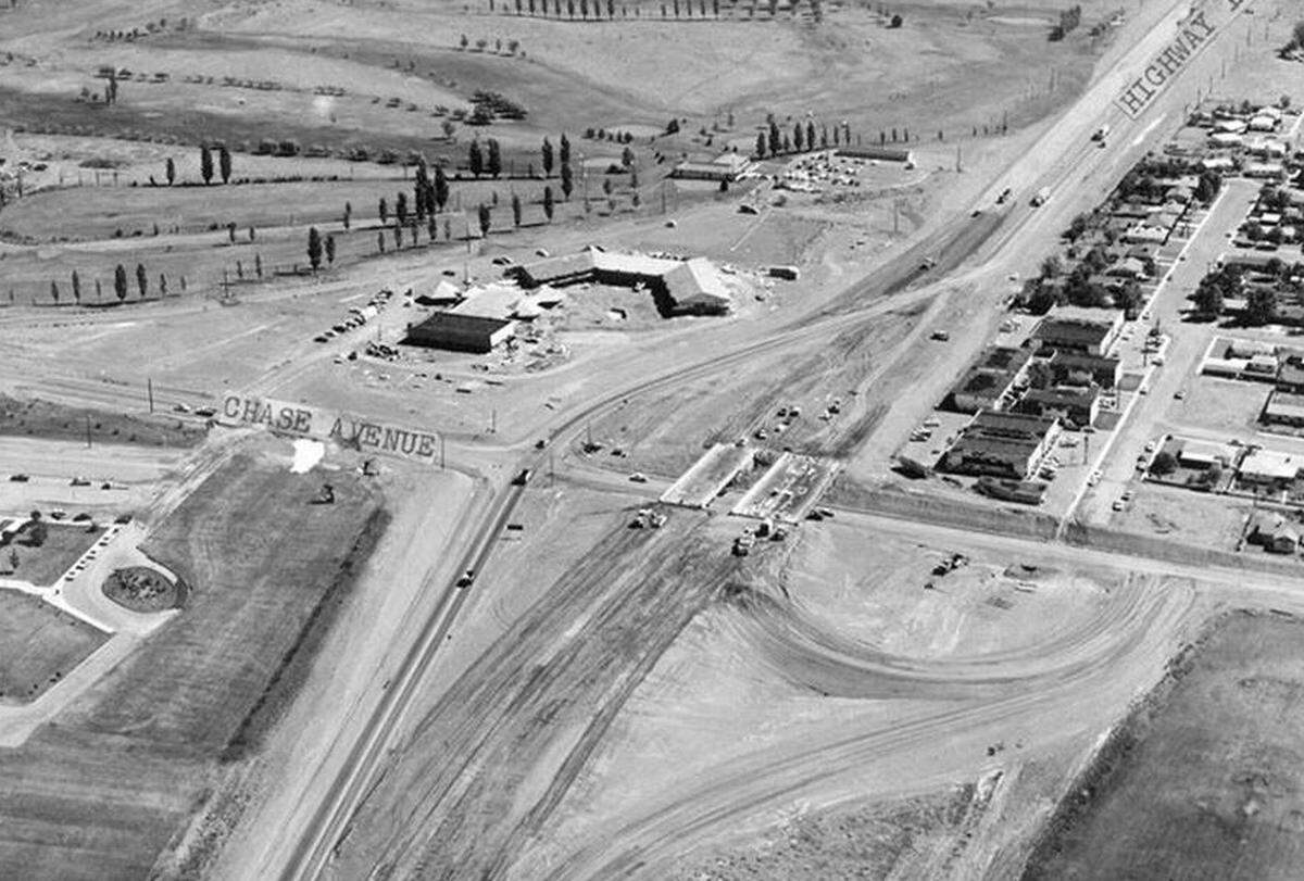 In this historic photo, Interstate 182 is being constructed over North 20th Avenue, then called Chase Avenue. Columbia Basin College is in the lower left corner. Sun Willows Golf Course and the Red Lion are in the upper left. I-182 construction began in the early 1970s.