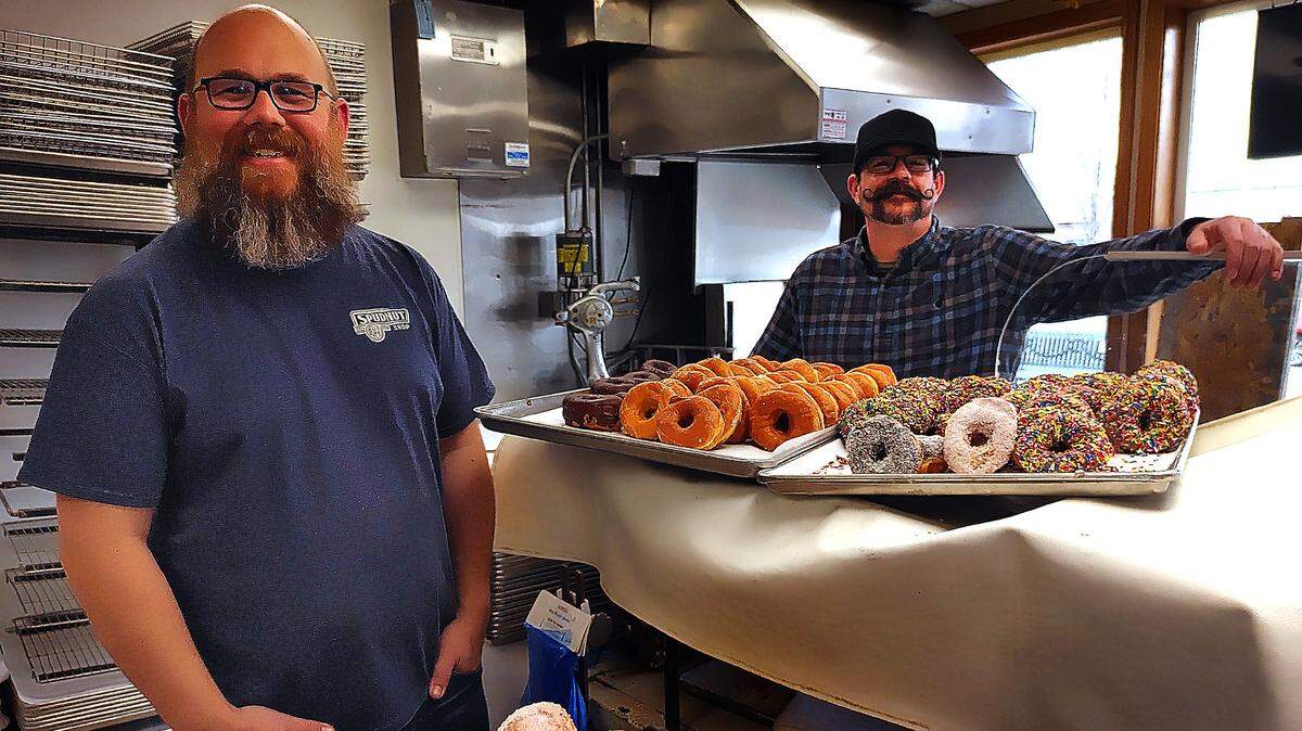 Mike Bishop, left, and Ryan Pierson, are the incoming owners of the Spudnut Shop in Richland. The Richland High School graduates vow to keep the beloved bakery and lunch spot the same after they take over from Val and Doug Driver.