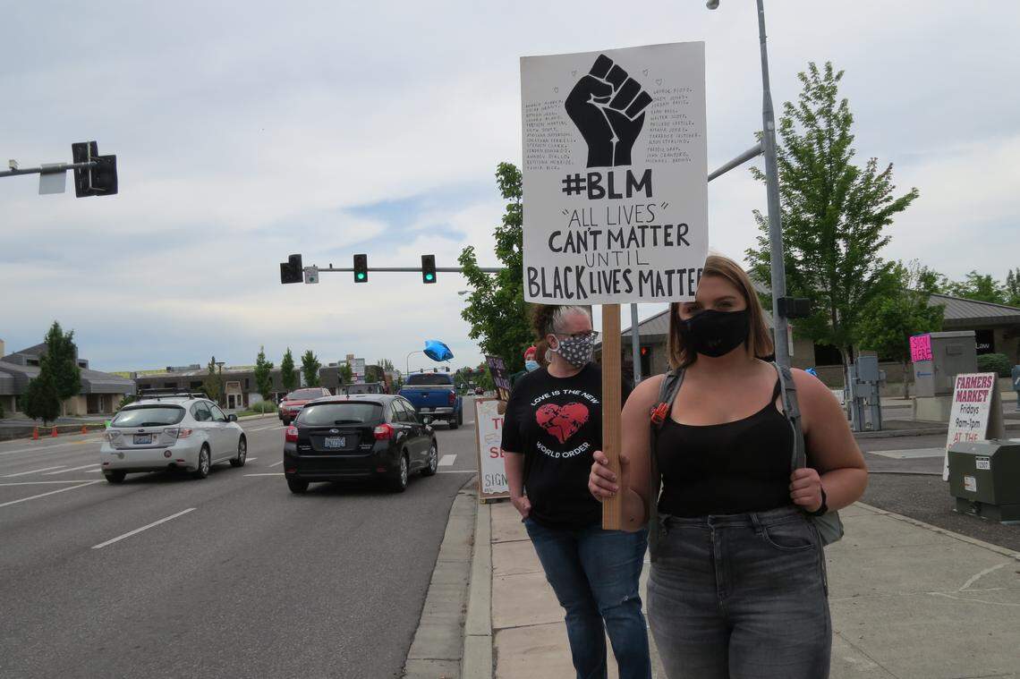 People gathered along George Washington Way on Saturday to call for justice for George Floyd.