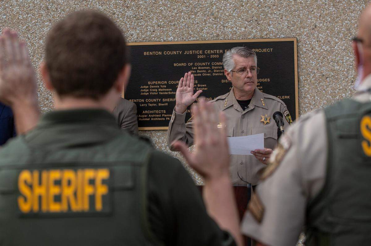 In 2021, Benton County Sheriff Tom Croskrey swore in deputies in front of the Benton County Justice Center in Kennewick moments after he was sworn in as the new sheriff. He was appointed to the position following a recall vote of Jerry Hatcher.