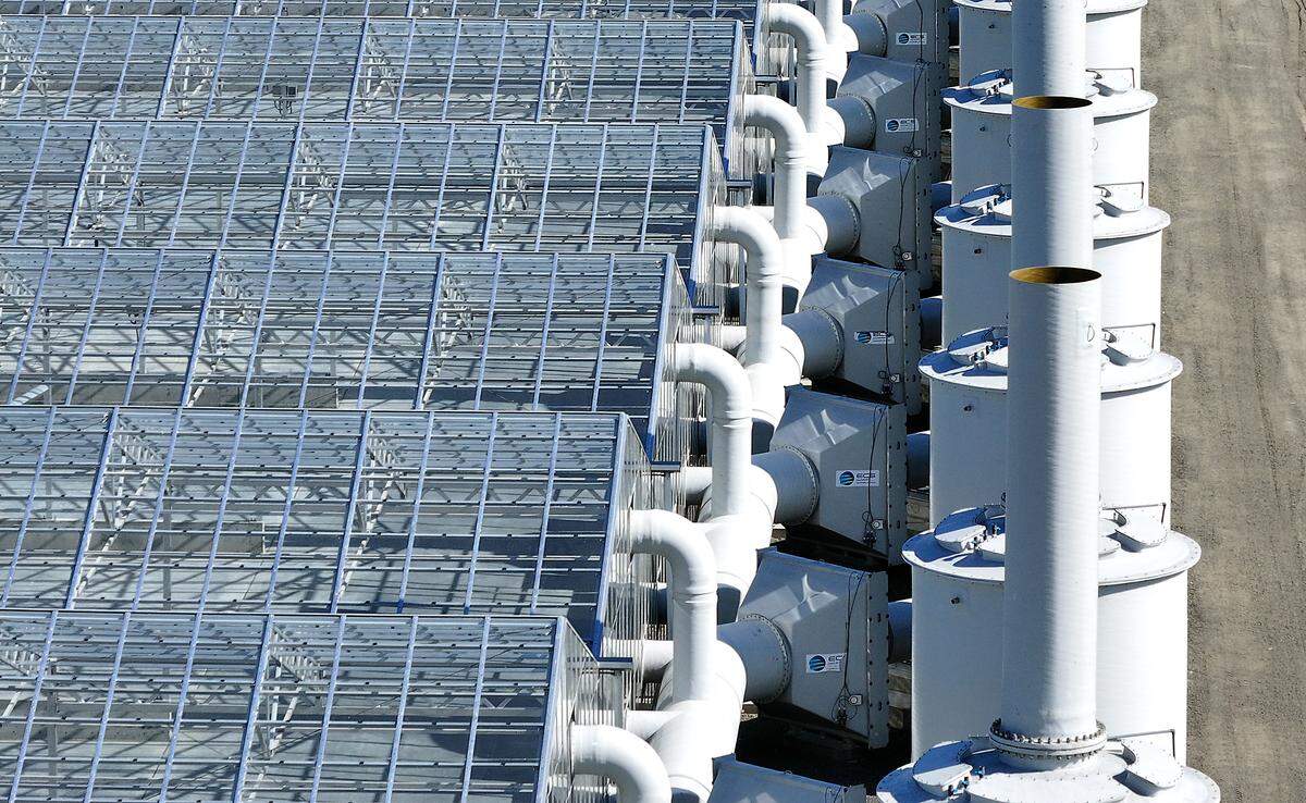 The $43 million biosolids treatment plant uses enclosed greenhouse drying, controlled oven pasteurization and pelletization to produce a marketable fertilizer.