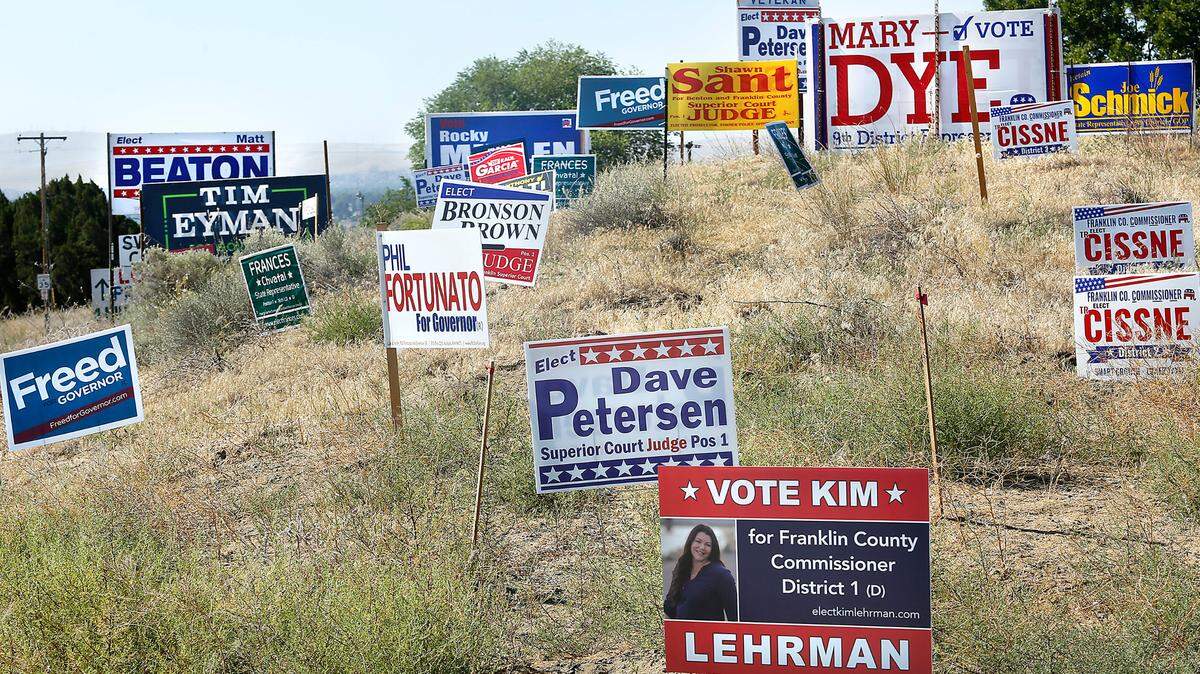 Numerous political signs for a variety of local and state positions are posted in a high-traffic area on Road 68 near Chapel Hill Boulevard in Pasco for the upcoming 2020 elections.