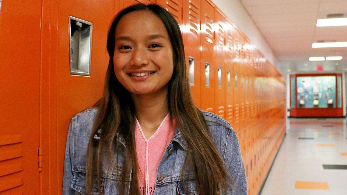 Tho Paw, who's graduating from Kennewick High School, was born in a refugee camp in Thailand. She learned English while attending Westgate Elementary and plans to become a teacher, inspired in part by her experiences there.