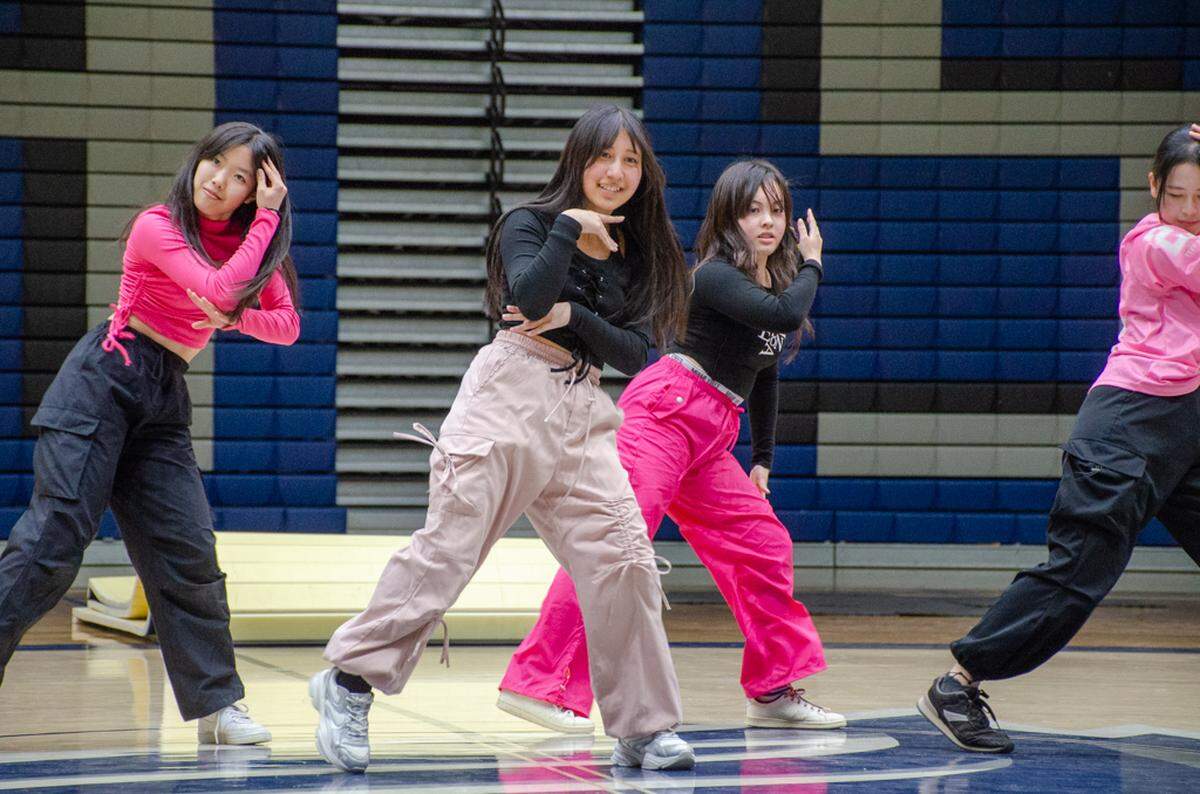 Members of the Yamate Gakuin Dance Club, “4-11 YGDC,” put on a performance for a packed Chiawana High School gymnasium at the community’s International Night.