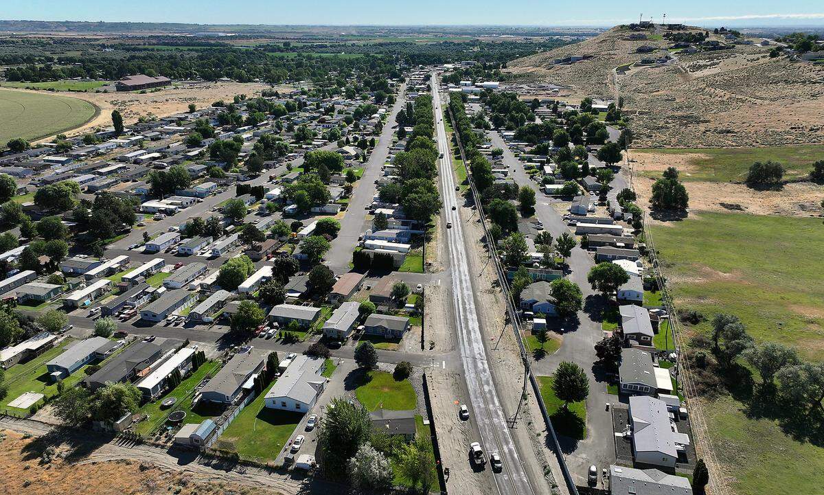 West Van Giesen Street in West Richland also known as Highway 224, with Flat Top hill at right.