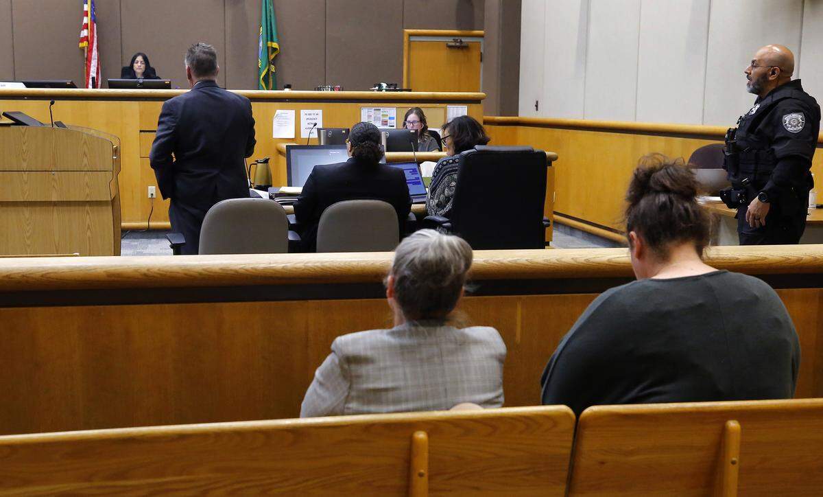Defense Attorney Bob Thompson, standing at left, talks to Benton County Superior Court Judge Norma Rodriguez during the murder trial for Marcell Cola Wednesday in Kennewick. Cola is the first of four accused shooters to go on trial in Benton County for the October 2022 shooting death of Jatzivy Sarabia.