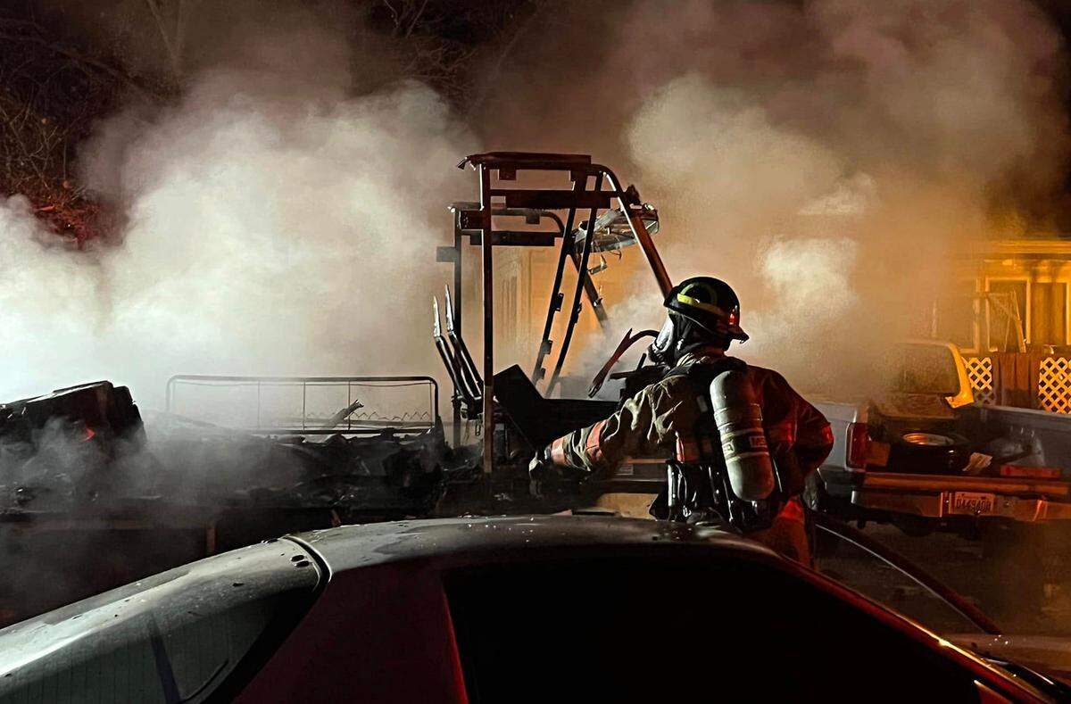 A woman was burned in an early morning explosion and fire in the Finley area Friday.