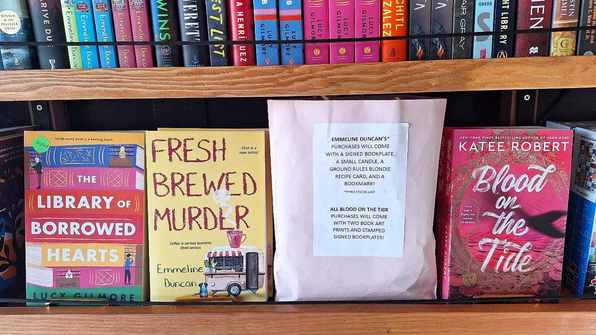Examples of PNW authors on the shelves of the Traveling Book Bus.