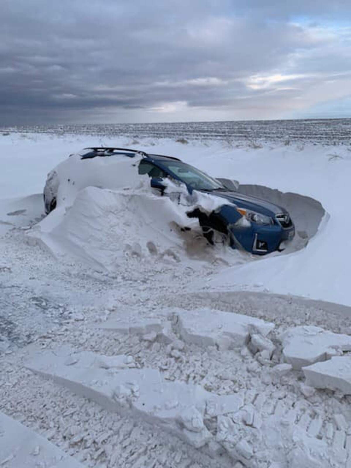 Strong winds caused snow to drift in rural Benton County, stranding cars in the area of Sellards and Travis roads late Wednesday night and early Thanksgiving morning.