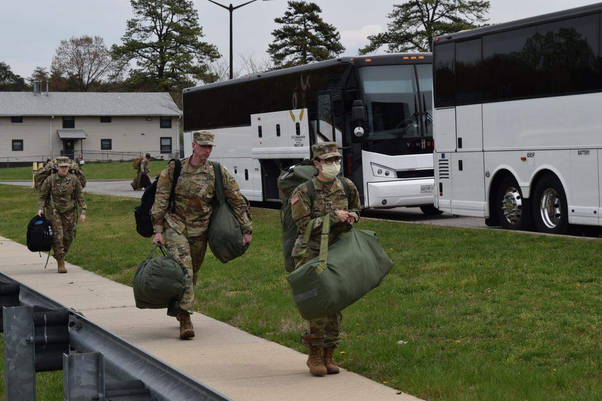Army Capt. Natalie Trujillo wears a face mask as a precautionary measure while she and other officers lead soldiers in an Urban Medical Task Force being mobilized to combat the COVID-19 pandemic in New York. They were at the John E. Smathers Reserve Center, Fort Meade, MD, on April 7.