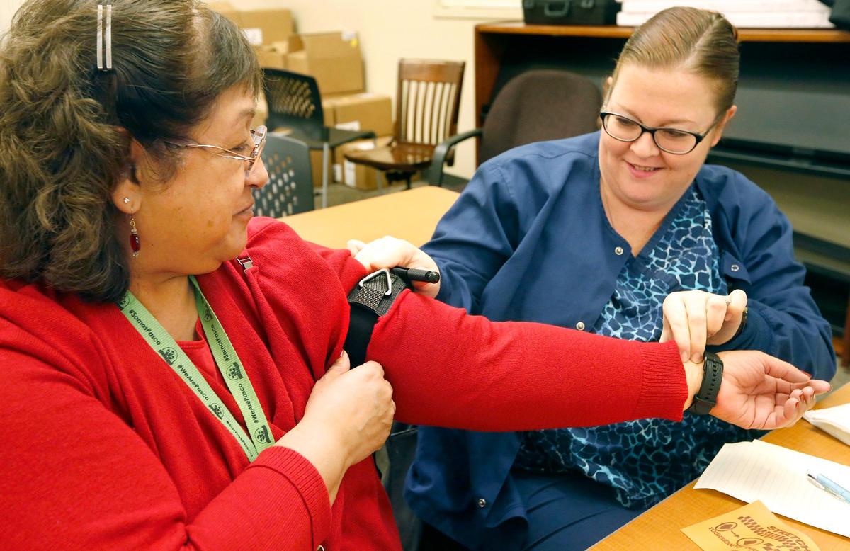 Pasco school nurses Anita Barnard, left, and Denise Lang practice applying a tourniquet during a “Stop the Bleed’ trauma training session held by the Pasco Fire Department Wednesday at Chiawana High School in Pasco. The fire department purchased 30 “Stop the Bleed” trauma kits for district staff to place in schools. Watch a video at: tricityherald.com/video