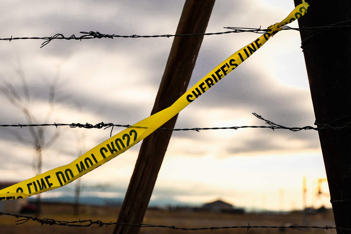 Investigators remained Saturday at a house on North Harrington Road where two bodies were found after a fire.