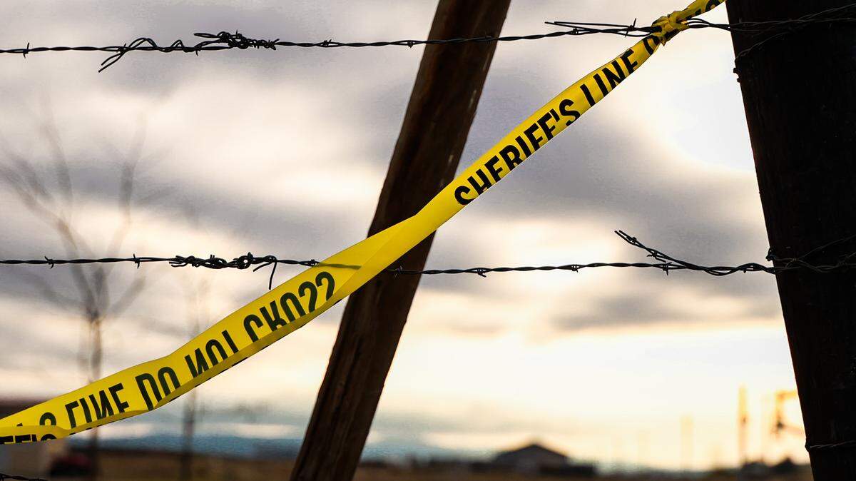 Police investigators remained Saturday at a house on North Harrington Road where two bodies were found after a fire. The house is about eight miles west of Richland near the Yakima River and Highway 240.